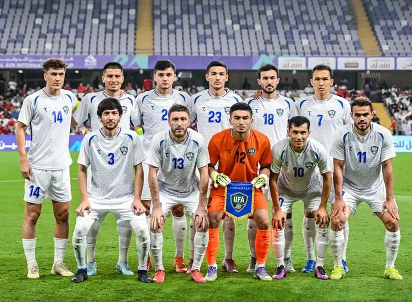 Uzbekistan players in World Cup 2026 group stage match against Colombia
